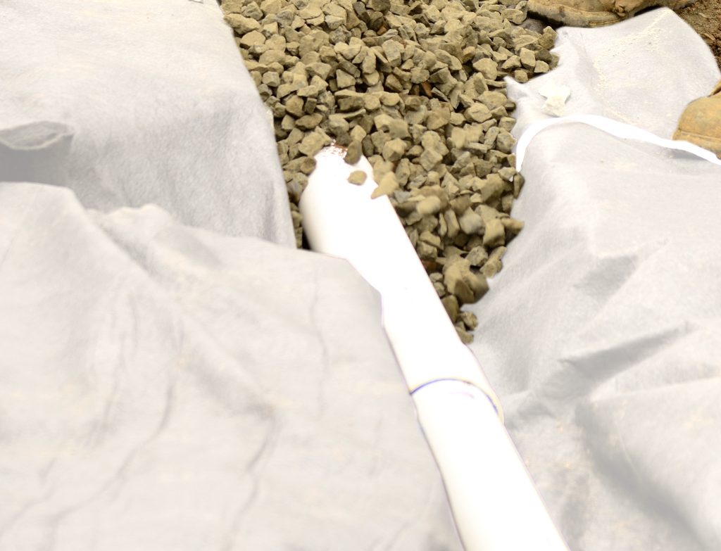 The difference between a drain membrane and porous landscape fabric